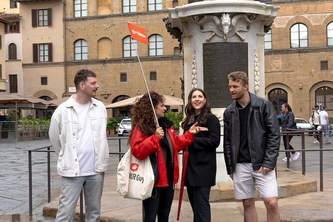 Florence Evening Food Tour with Florentine Steak & Tuscan Wine - A toast at the wine window