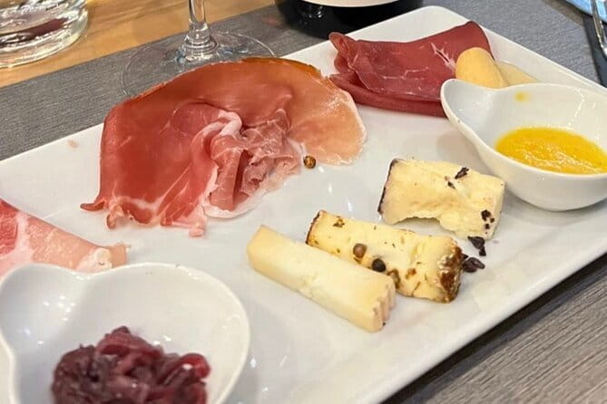 Florence Food Tour with Truffle Pasta, Steak & Free Flowing Wine - Follow the wine window and sample more crostini