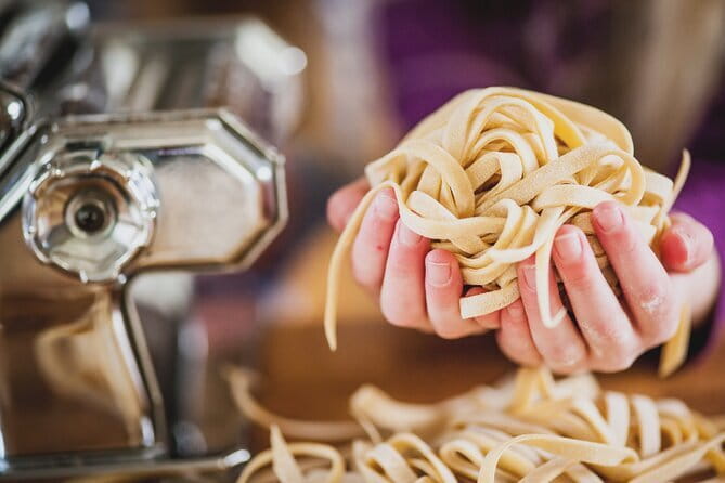 Florence: Pasta Cooking Class with Unlimited Wine - A pasta lesson in a tower near the Duomo