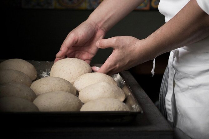 Pizza Making Private Class with Wine Tasting - Mixing, shaping, and saucing your pizza