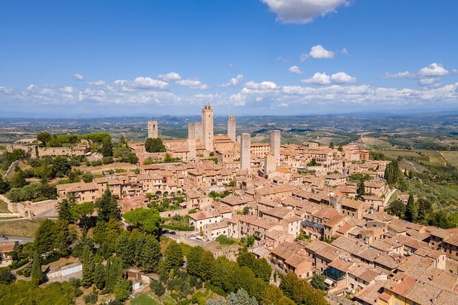 San Gimignano, Siena, Monteriggioni, Chianti Day Trip with Lunch & Wine Tasting - San Gimignano: towers, lanes, and a short window